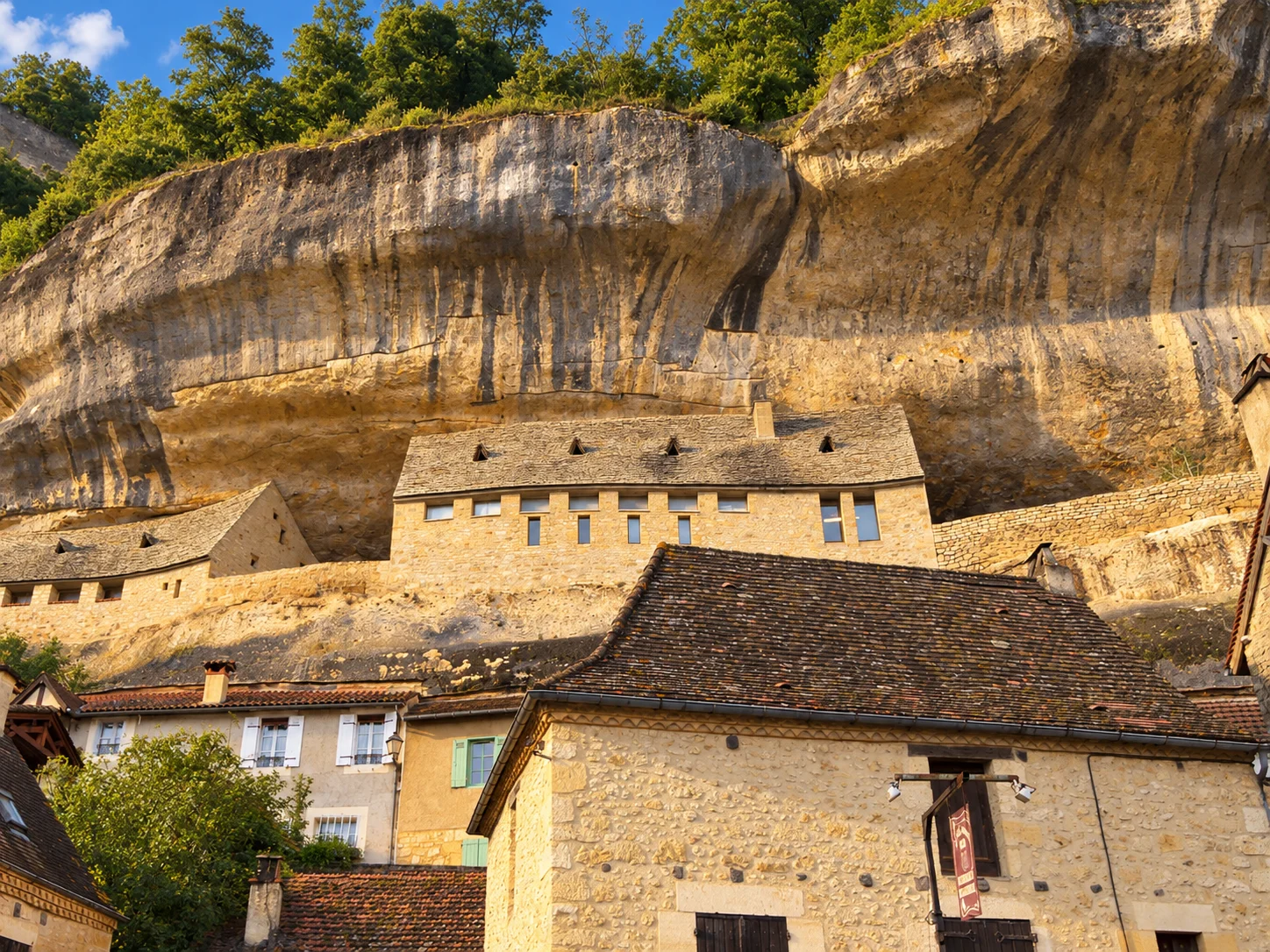 Houses built into the limestone cliff at Les Eyzies