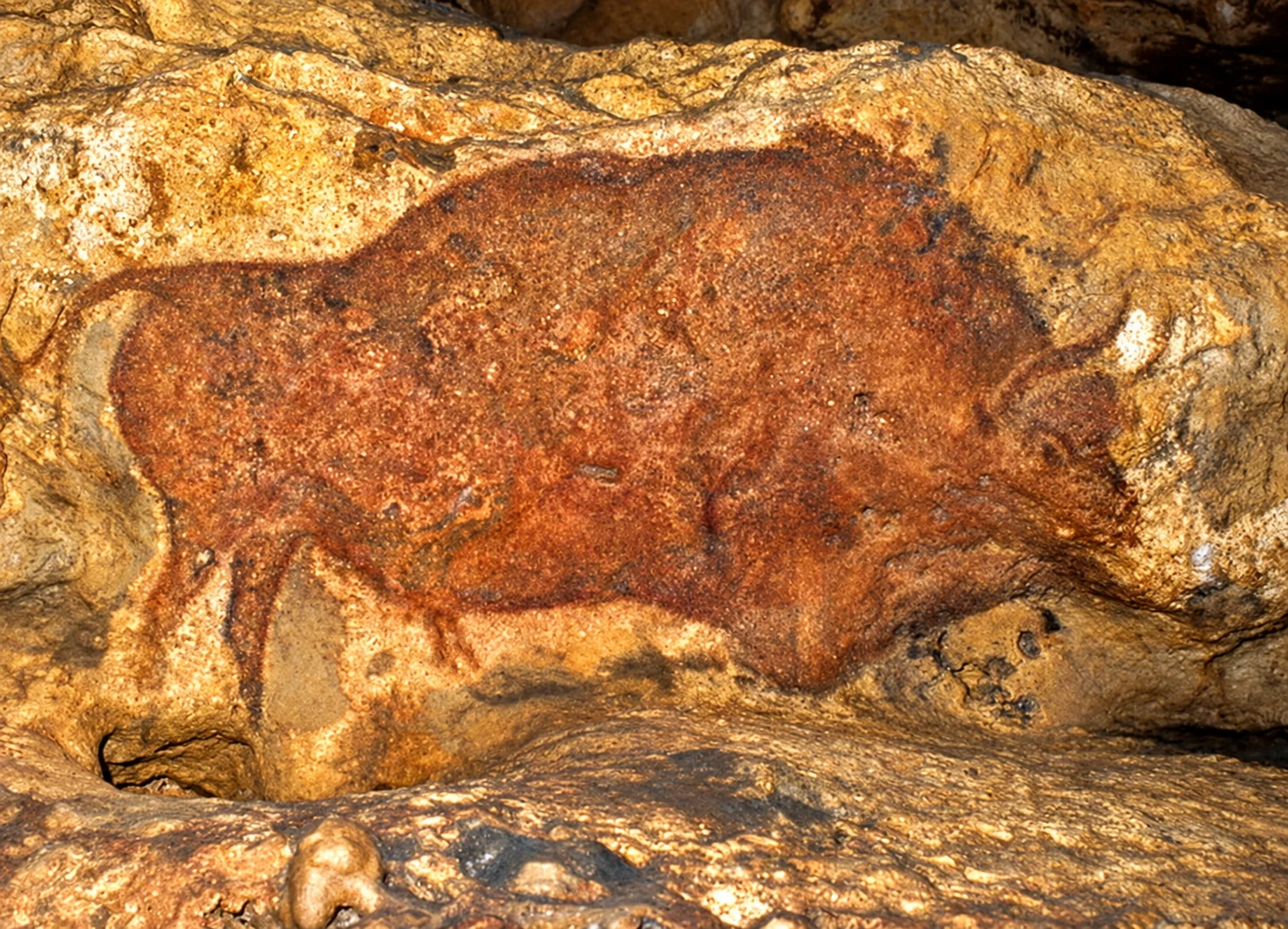 Font-de-Gaume cave, re-rendered from an openly licensed photo (Summer · Deep brochure blue · Golden hour)