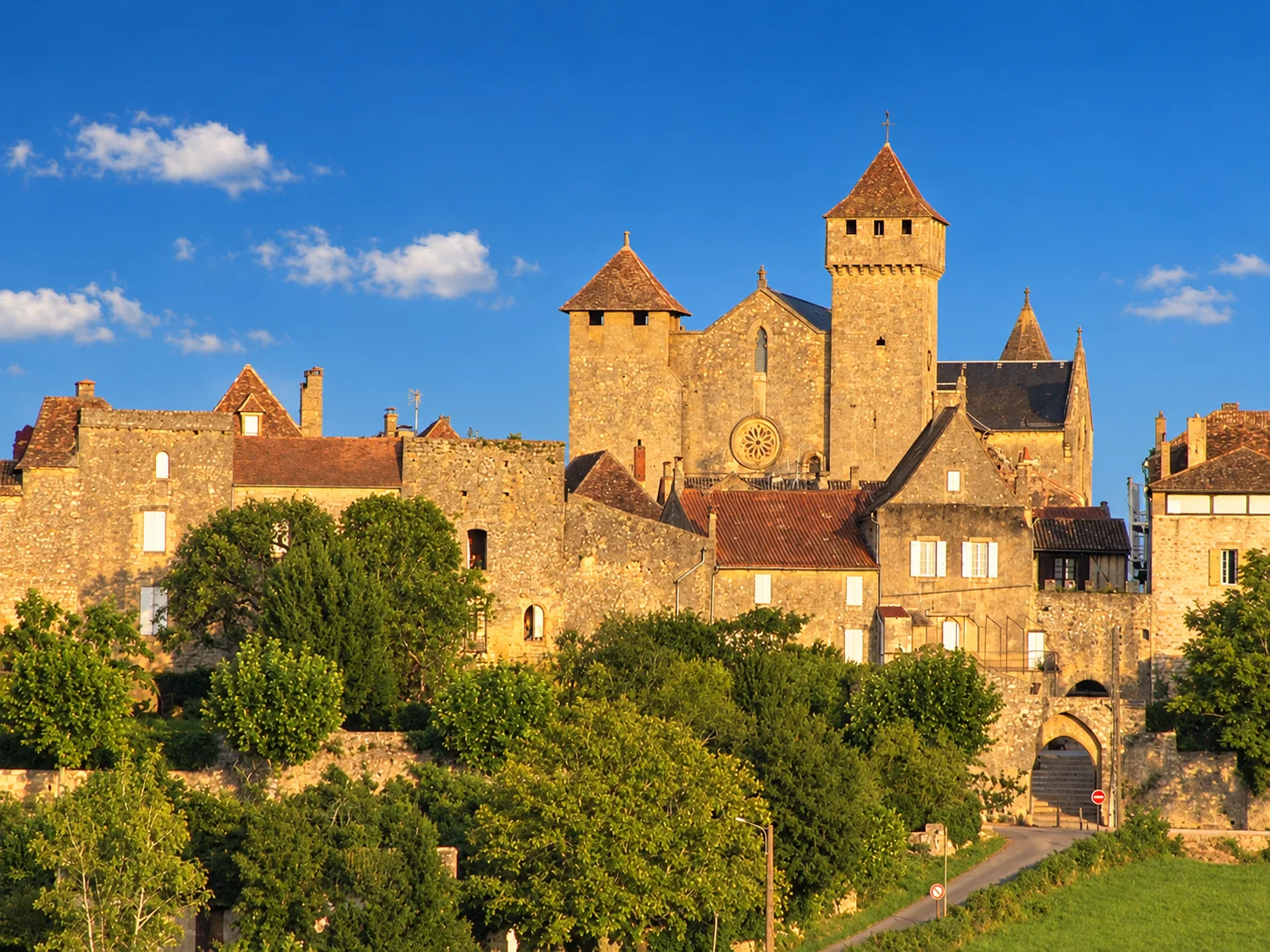Beaumont-du-Périgord, re-rendered from an openly licensed photo (Summer · Deep brochure blue · Golden hour)